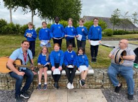  Mr Malachi Cush and the pupils of Windmill I.P.S St Patrick's Primary School Dungannon, Dungannon Primary School and Howard Primary School.